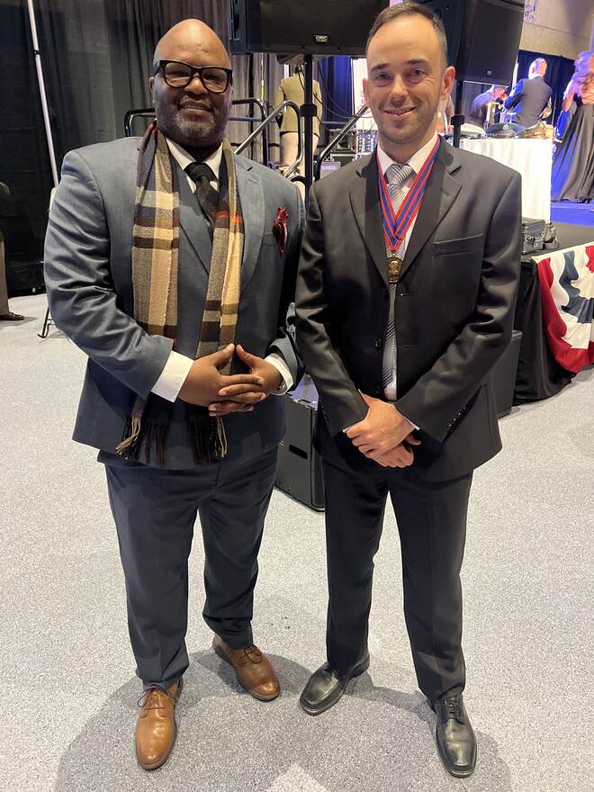Nikos Katsikanis standing with Shannon Tyus during the National Ball